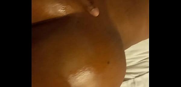 Mature and corpulent darksome brown bitch masturbating in bed
